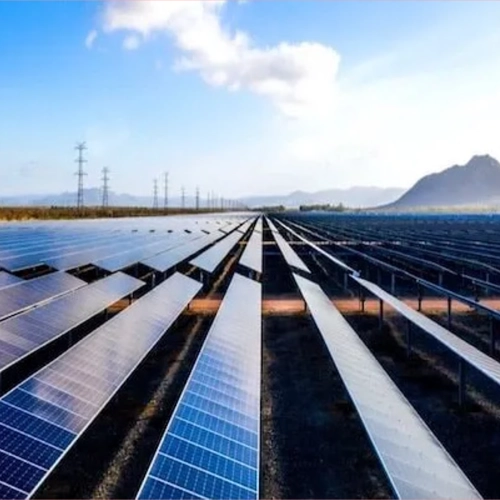 Solar panels installed across a utility-scale renewable energy facility.