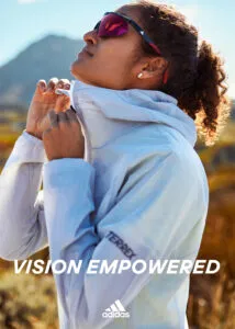 Woman in blue hoodie with sunglasses looking up, Adidas Vision Empowered campaign