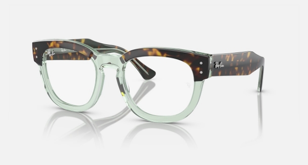 Transparent green and tortoiseshell Ray-Ban eyeglasses on white background