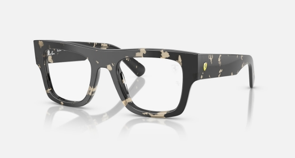 Black and white tortoiseshell Ray-Ban eyeglasses with thick frames
