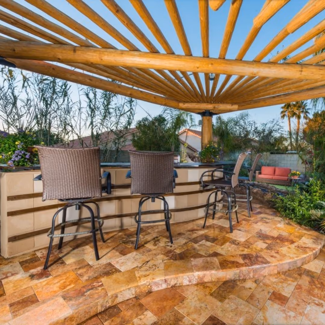 chairs underneath a custom shade structure
