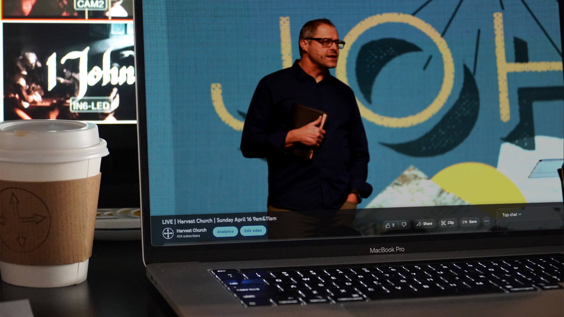 Sermons page background image of a laptop screen showing Pastor Steve preaching