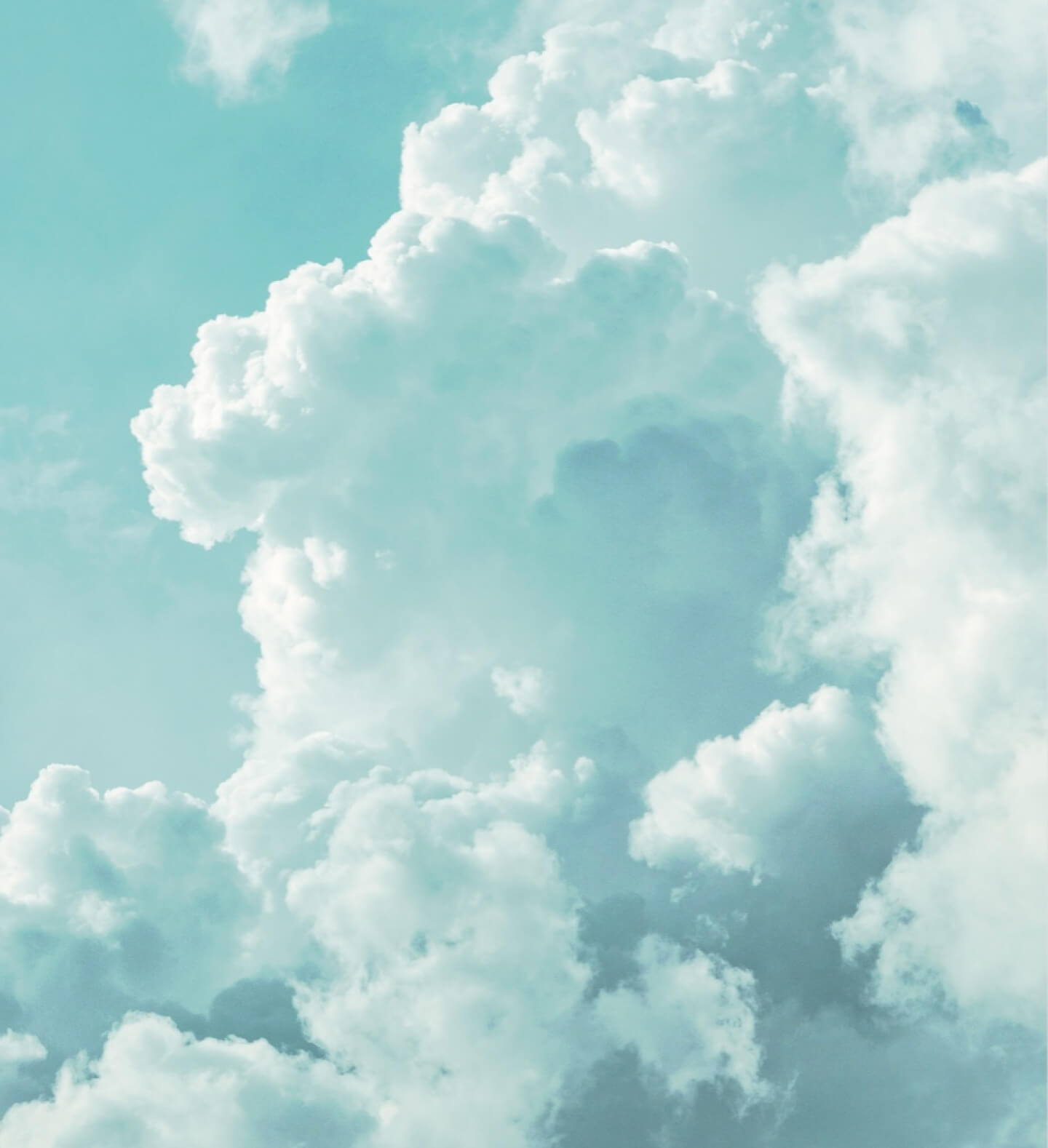 A third heavenly image of clouds in a lovely gradient of ice, cyan, and turquoise blues, meant to evoke imagery of Salvation through Jesus Christ, showcased on Harvest Church’s website