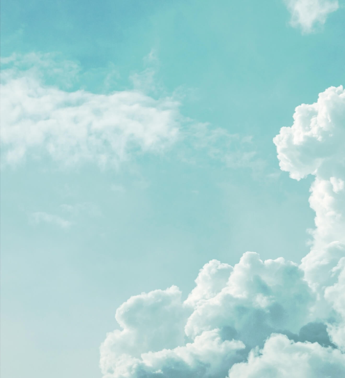 A fourth heavenly image of clouds in a lovely gradient of ice, cyan, and turquoise blues, meant to evoke imagery of Salvation through Jesus Christ, showcased on Harvest Church’s website