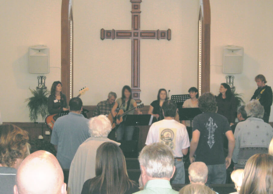 A grainy picture of an early Harvest Church service, when the church moved to the Village of Arroyo Grande