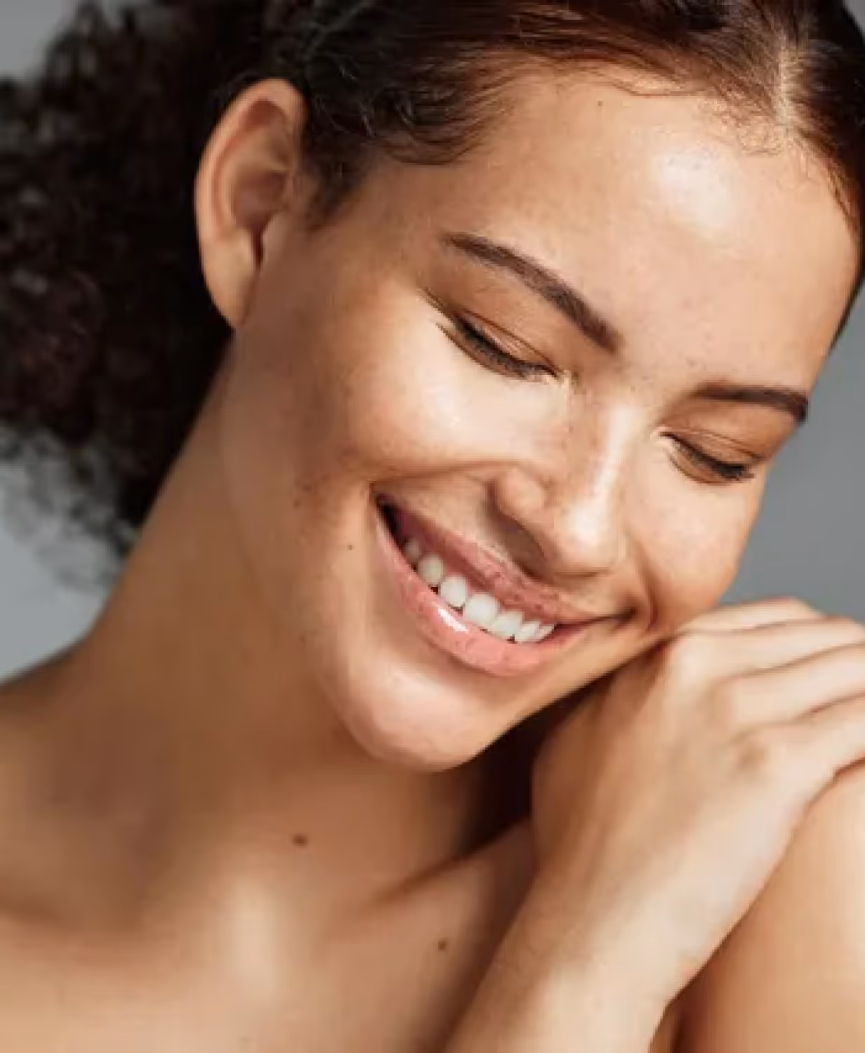 confident and happy woman with smooth skin