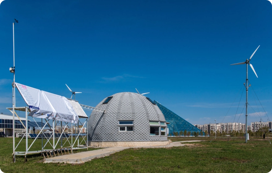 A building with a dome on top, under a clear blue sky