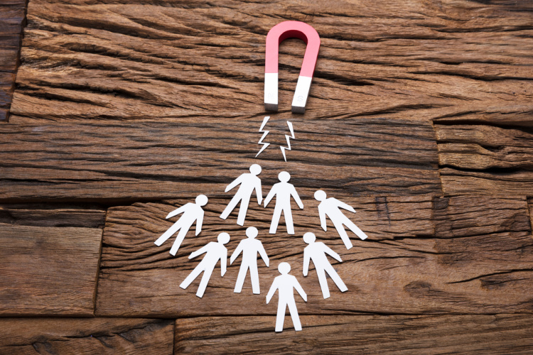 call to action magnet and paper cutout people