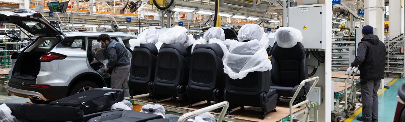 Efficient workers in a car factory