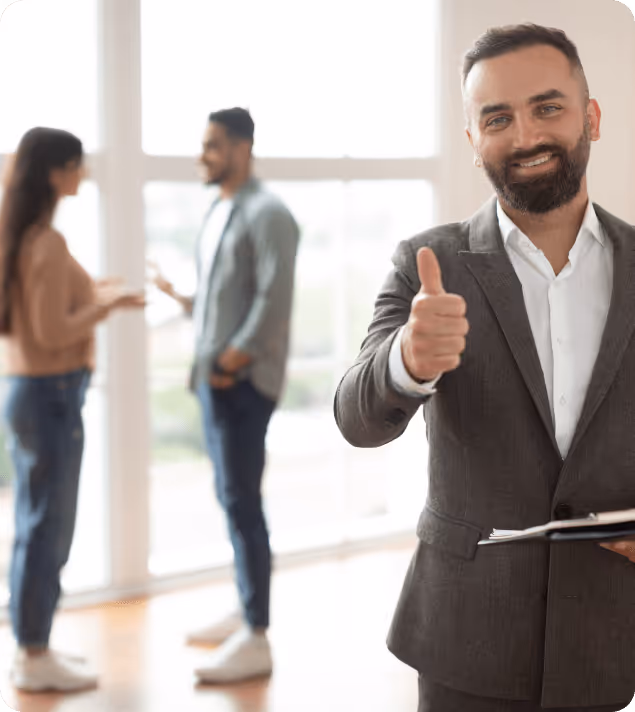 Guy giving thumbs up for approval.
