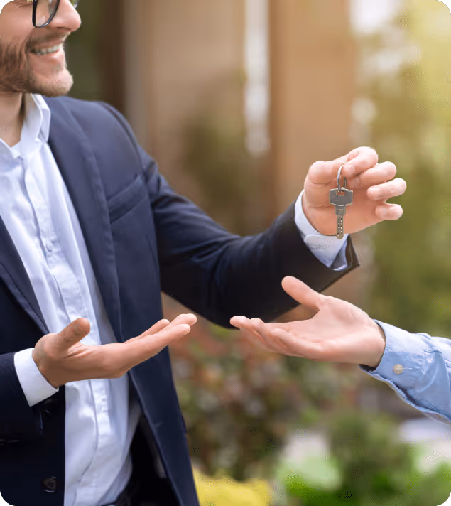 A guy handing over the house keys. 