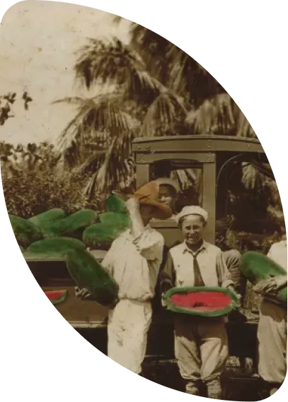 Sepia Historical Photograph of Farmers Holding Watermelons
