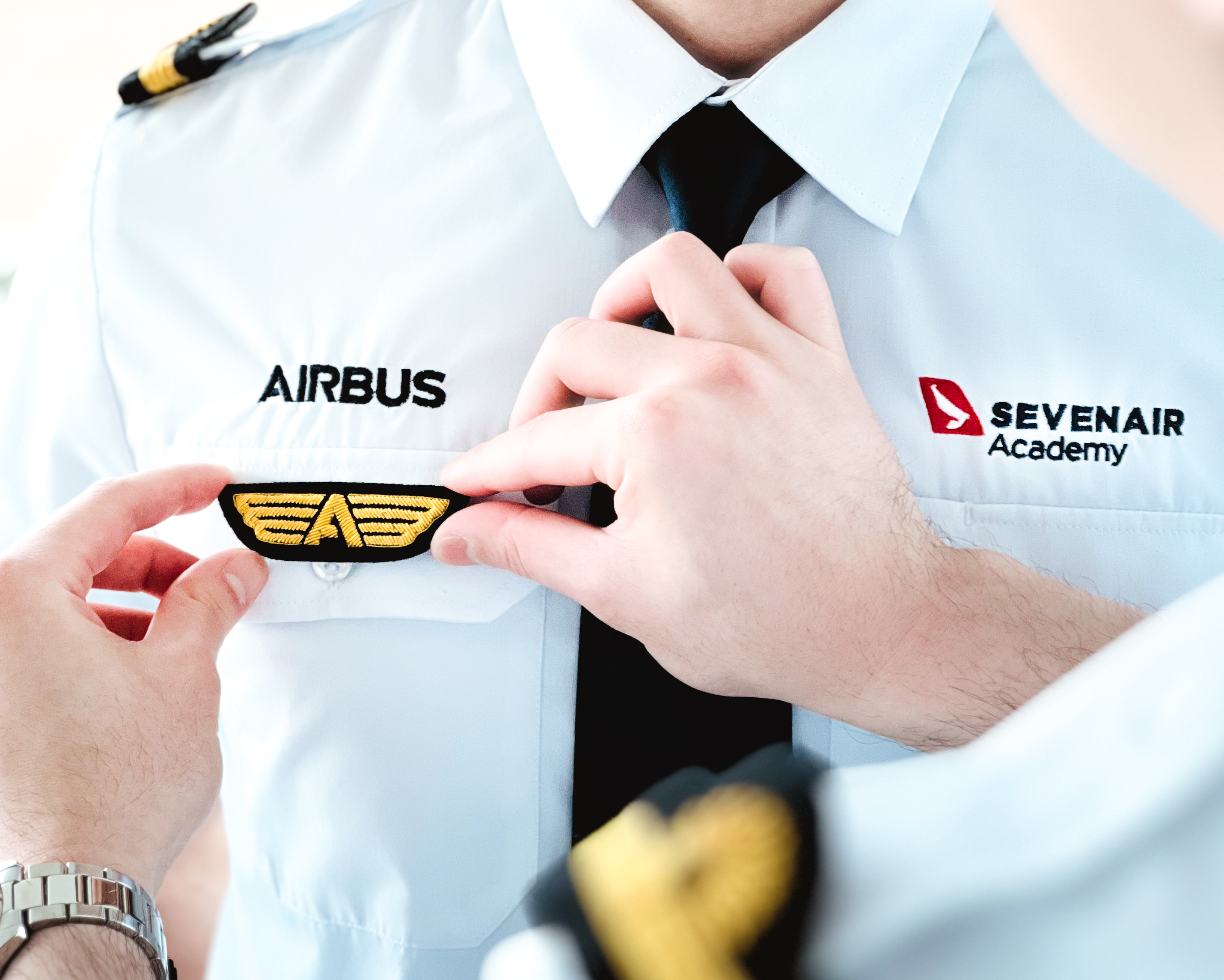 Airbus ATPi cadet receiving pilot wings on a Sevenair Academy uniform