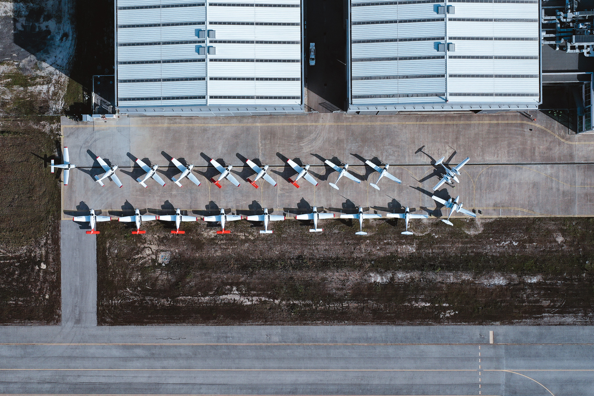 Aerial view of the Sevenair Academy training fleet lined up on the apron