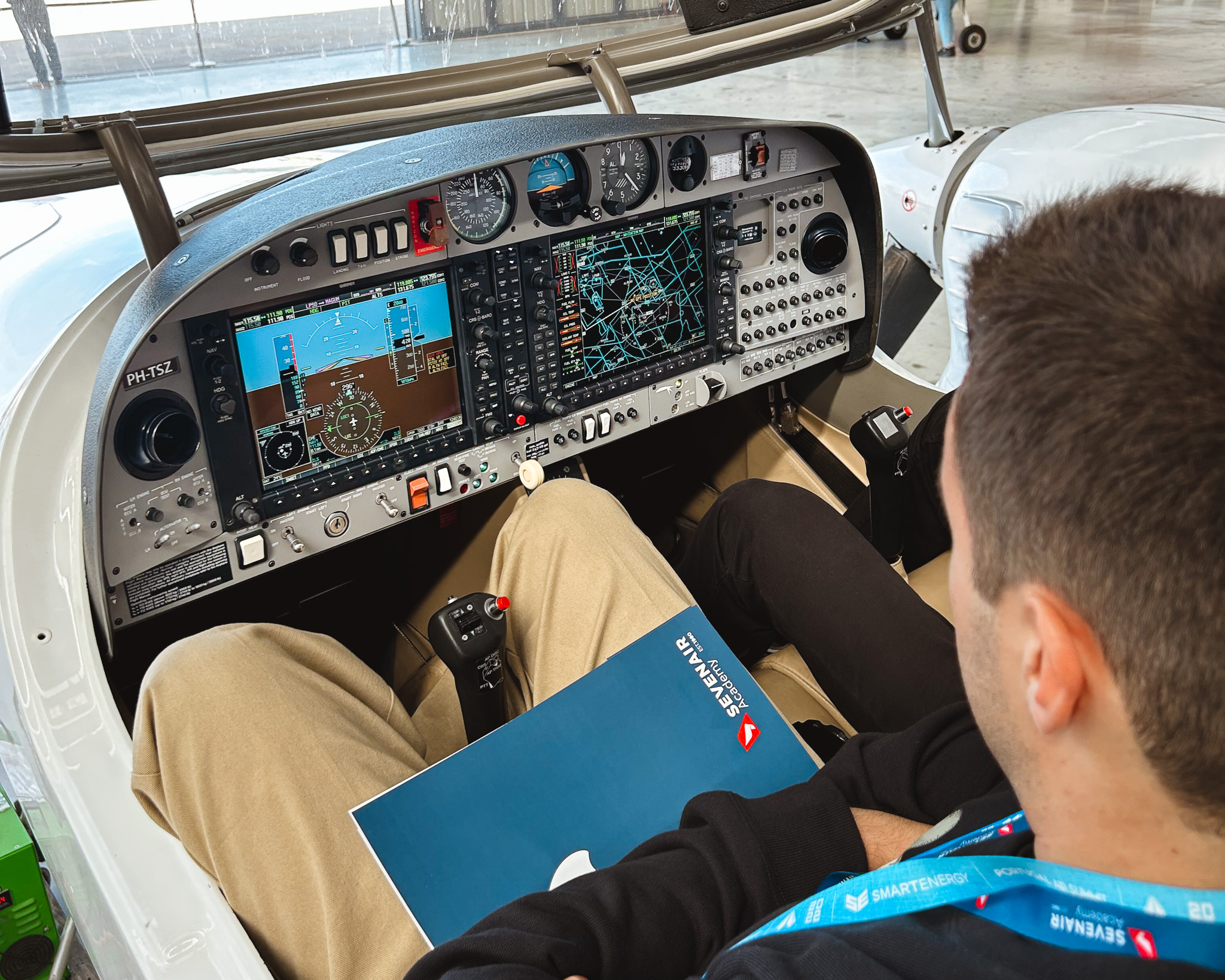 Student pilot at the controls of a DA42 with a Garmin G1000 glass cockpit