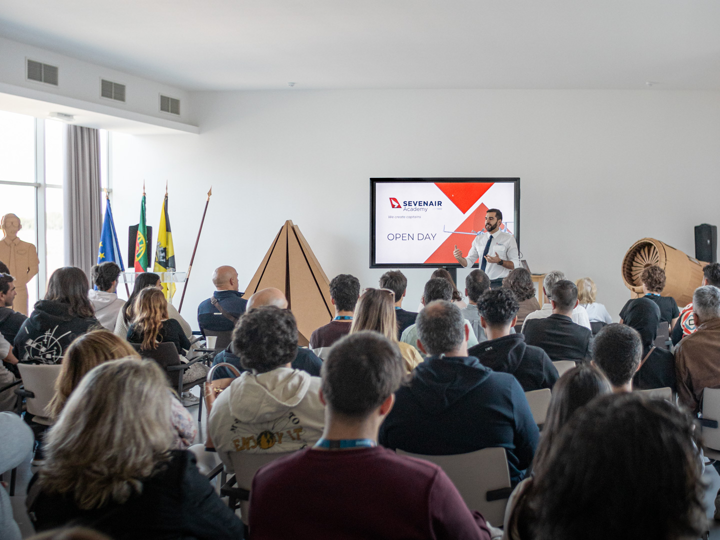 Instructor presenting to a group of students at Sevenair Academy