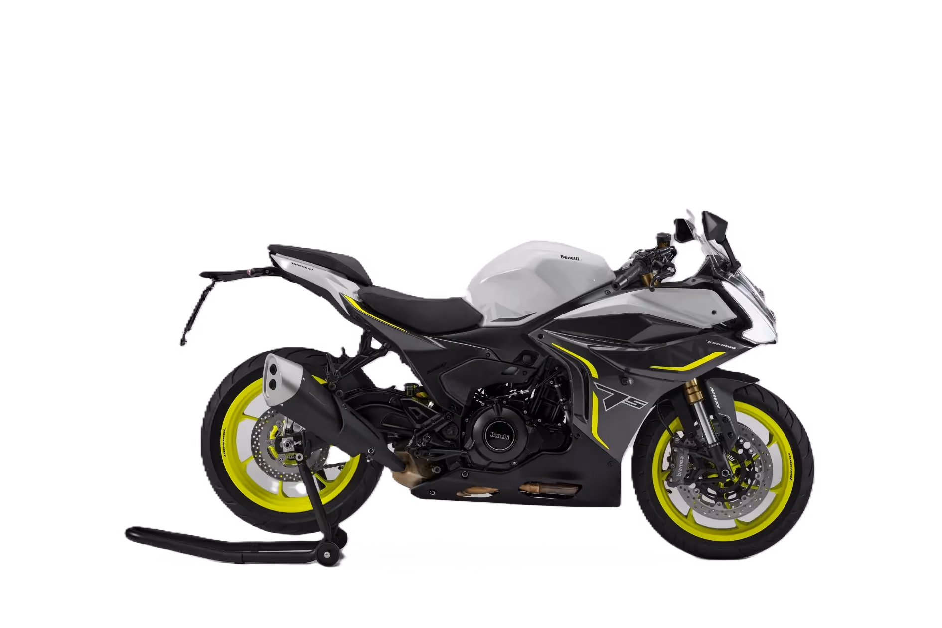 A rider performs an exhilarating stunt on a Benelli Tornado 550 motorcycle from Keeway America USA inside a gritty, industrial warehouse.