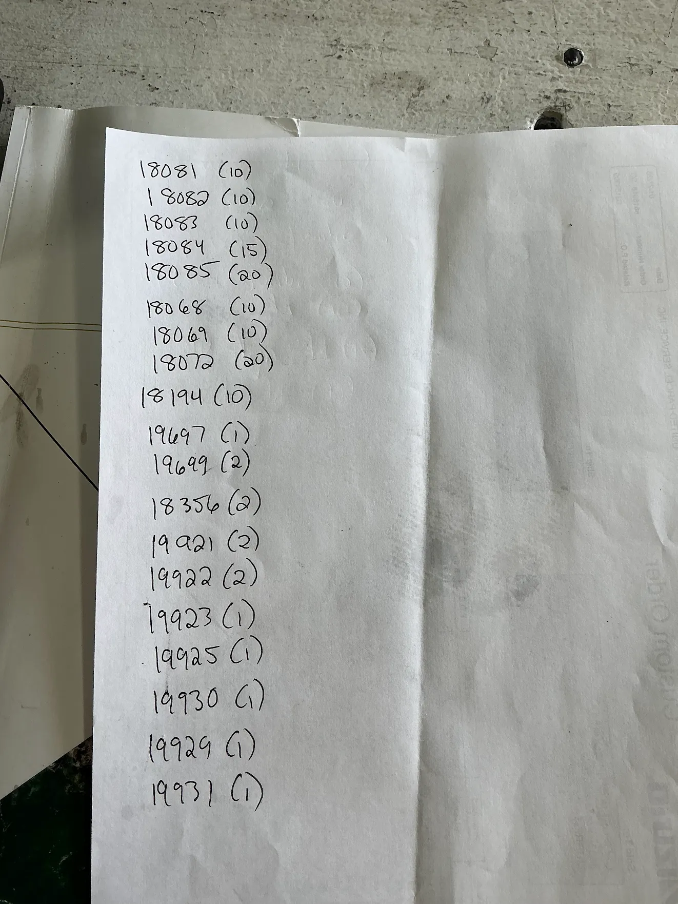 An example input to the AI agent — a handwritten note with SKU numbers and quantities