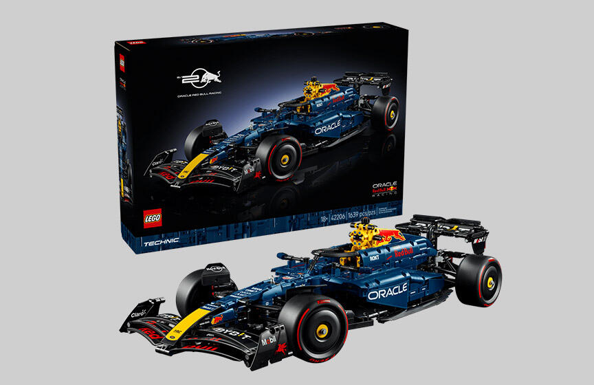 Lego Technic Oracle Red Bull Racing Formula 1 car model with box and assembled car on gray background.