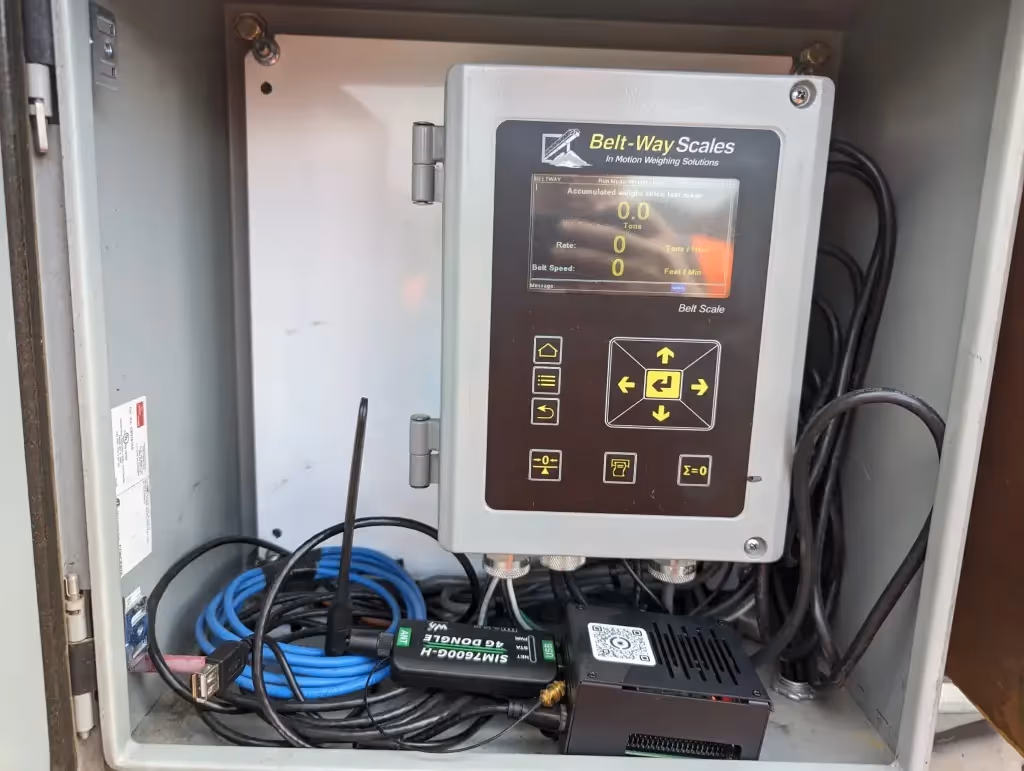 Picture of a CNC controller in the AIM facility with the SensPro IOT™ box hooked up