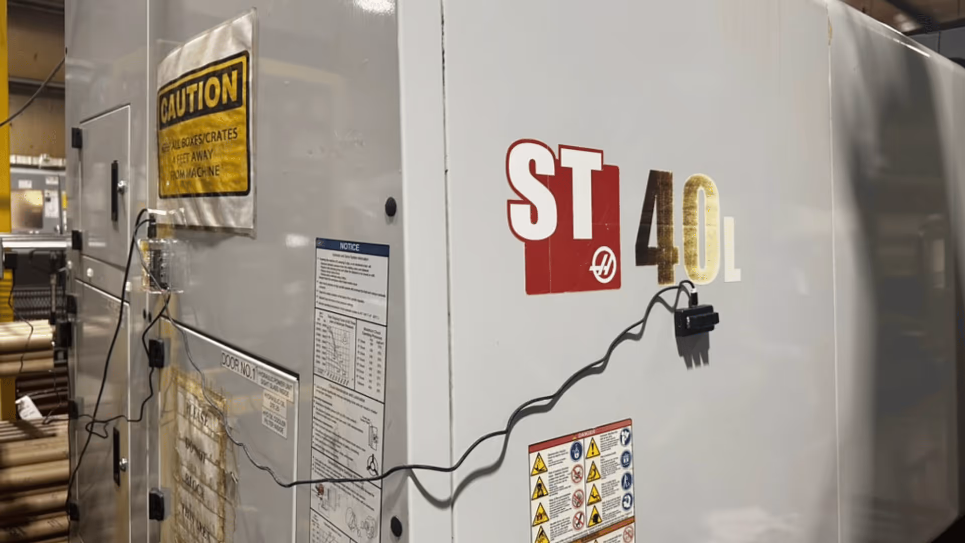 A SensPro IOT™ device on a machine on the shop floor, grabbing data