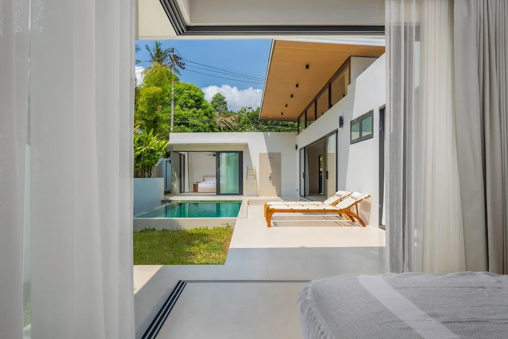 Villa Coco's bedroom pool and garden view