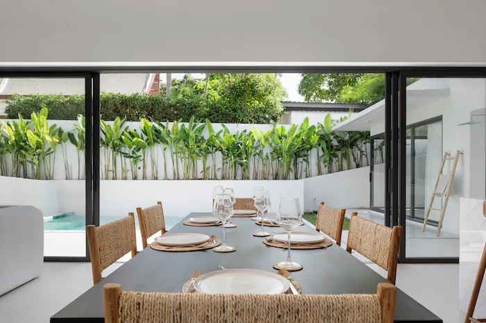 Dining table with plates and glasses