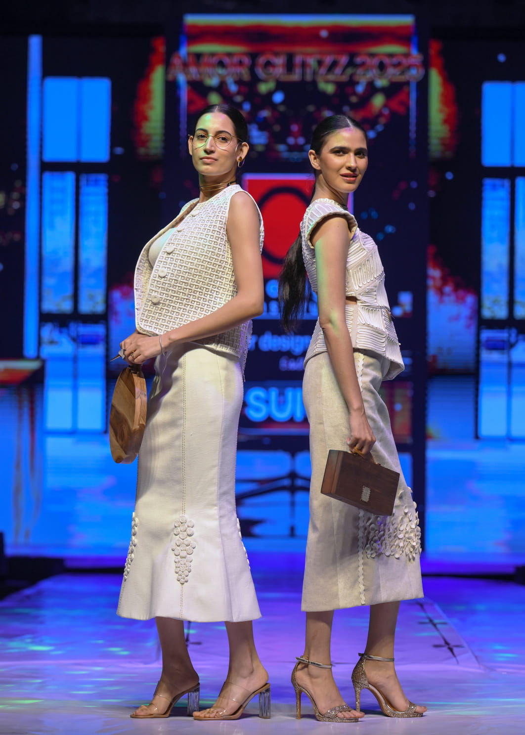 This pic shows Two Models on ramp at Amor Glittz event.