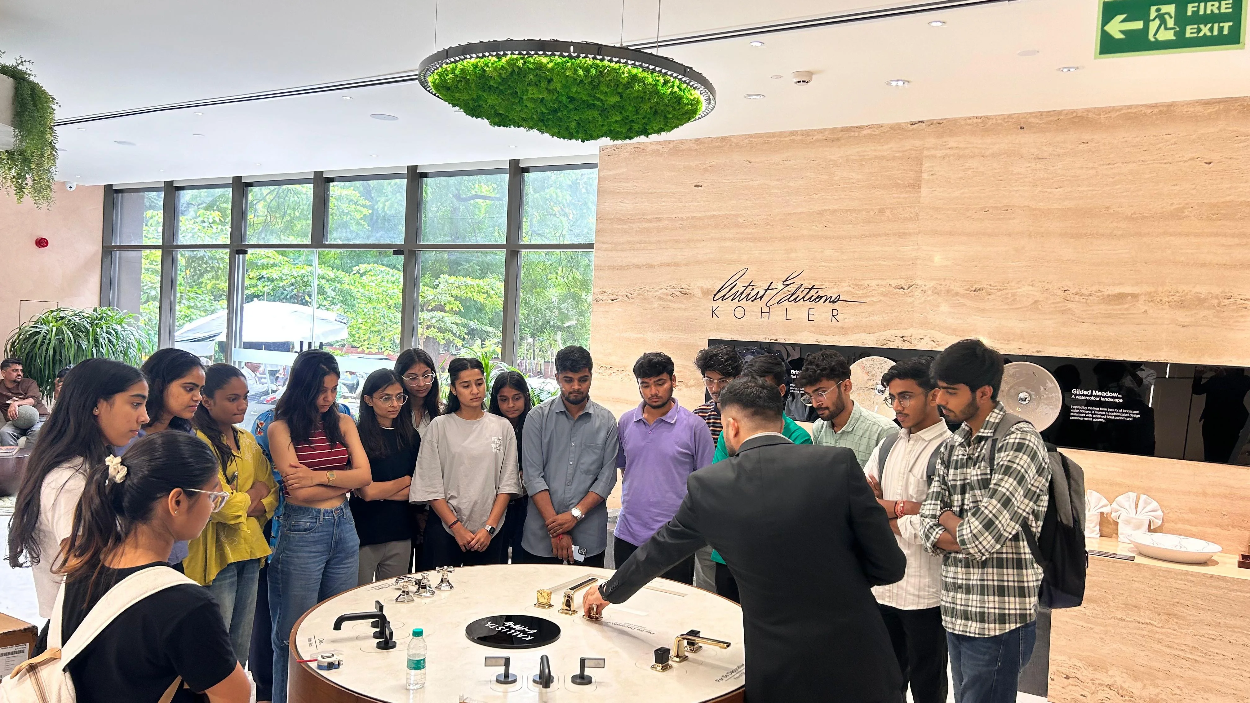 Interior design students from Amor Design Institute participating in a hands-on industry visit at a Kohler showroom, bridging the gap between classroom theory and professional design practice in Ahmedabad.