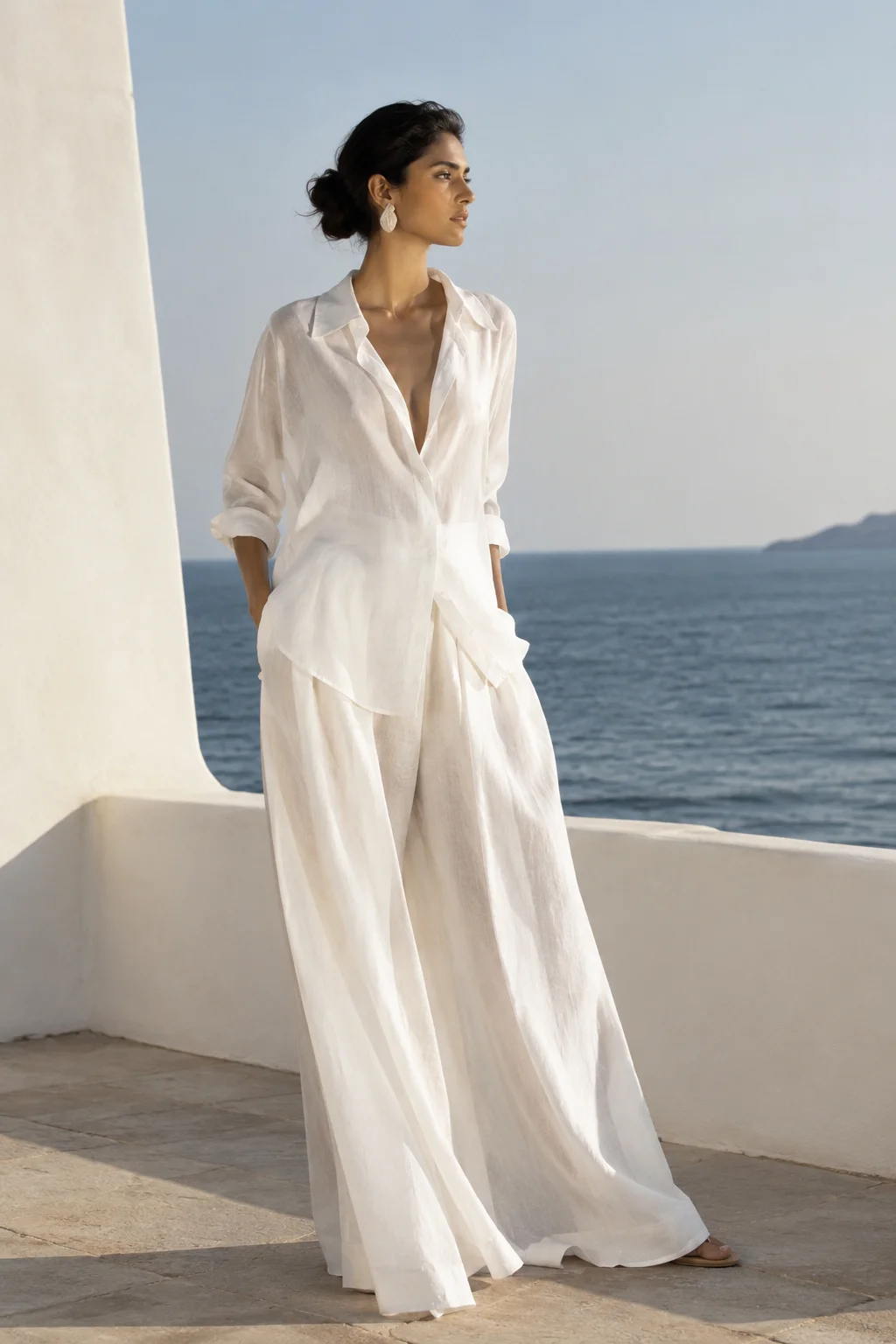 Minimalist eco-conscious white resort wear designed by Wendell Rodricks, who championed clean lines and Goan textile revival