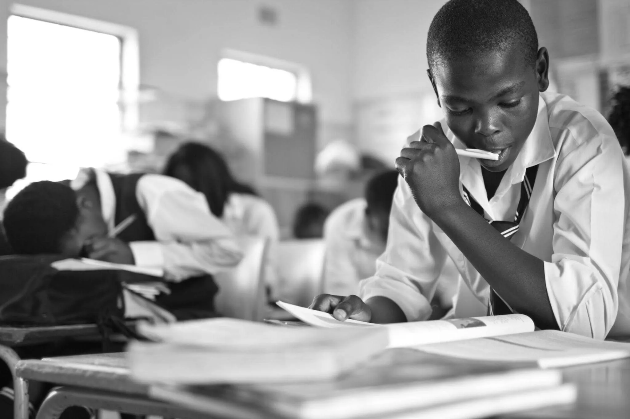 image of a chils studying inside classroom