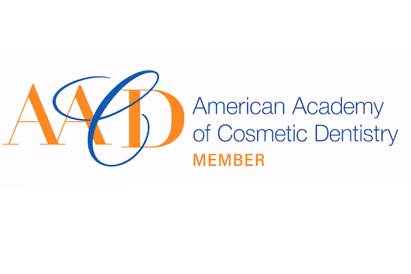 Dr. Chin is a proud member of the american academy of cosmetic dentistry. image is of the academy logo highlighting that Dr. Chin is a member.