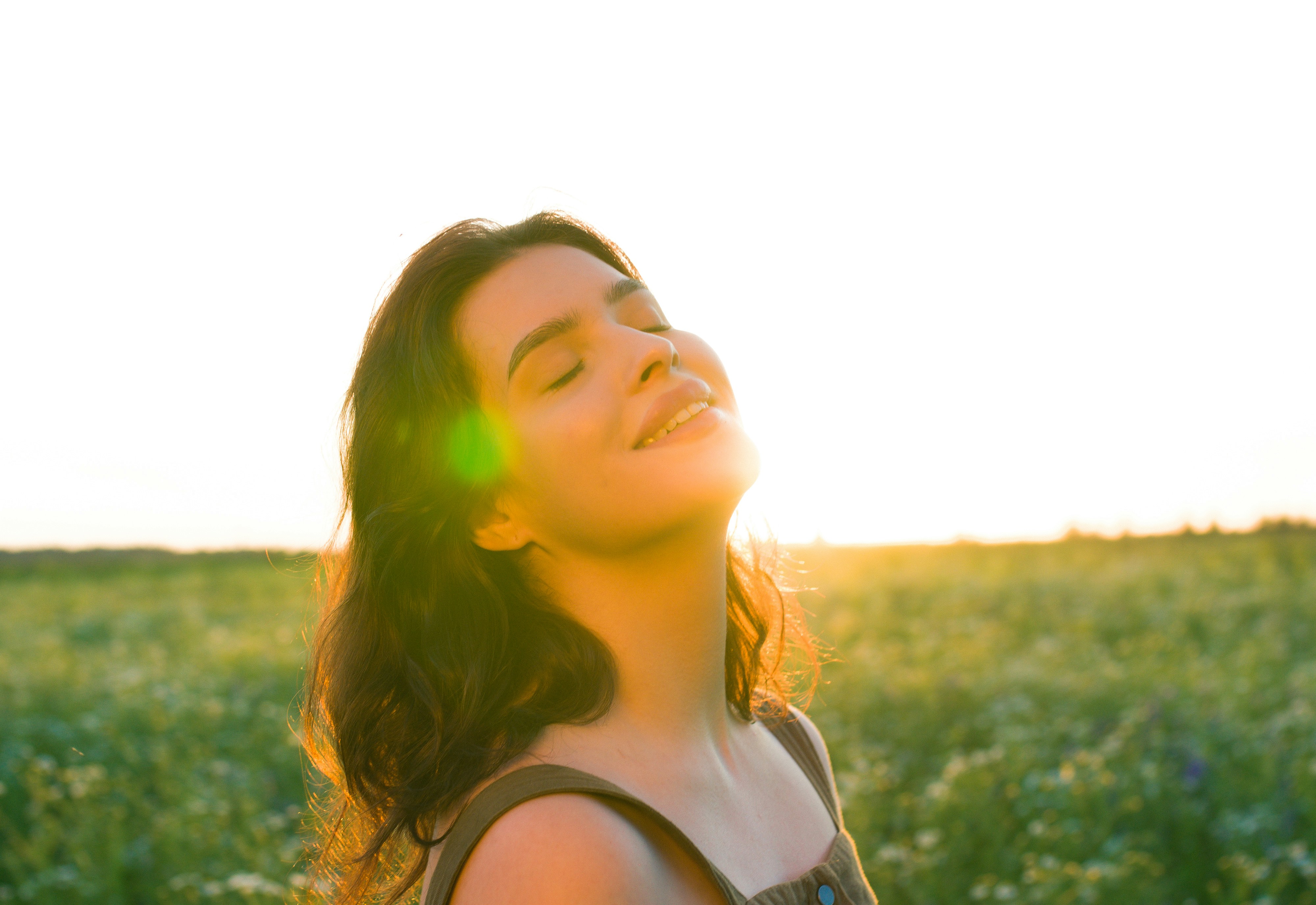 woman smiling and looking relieved
