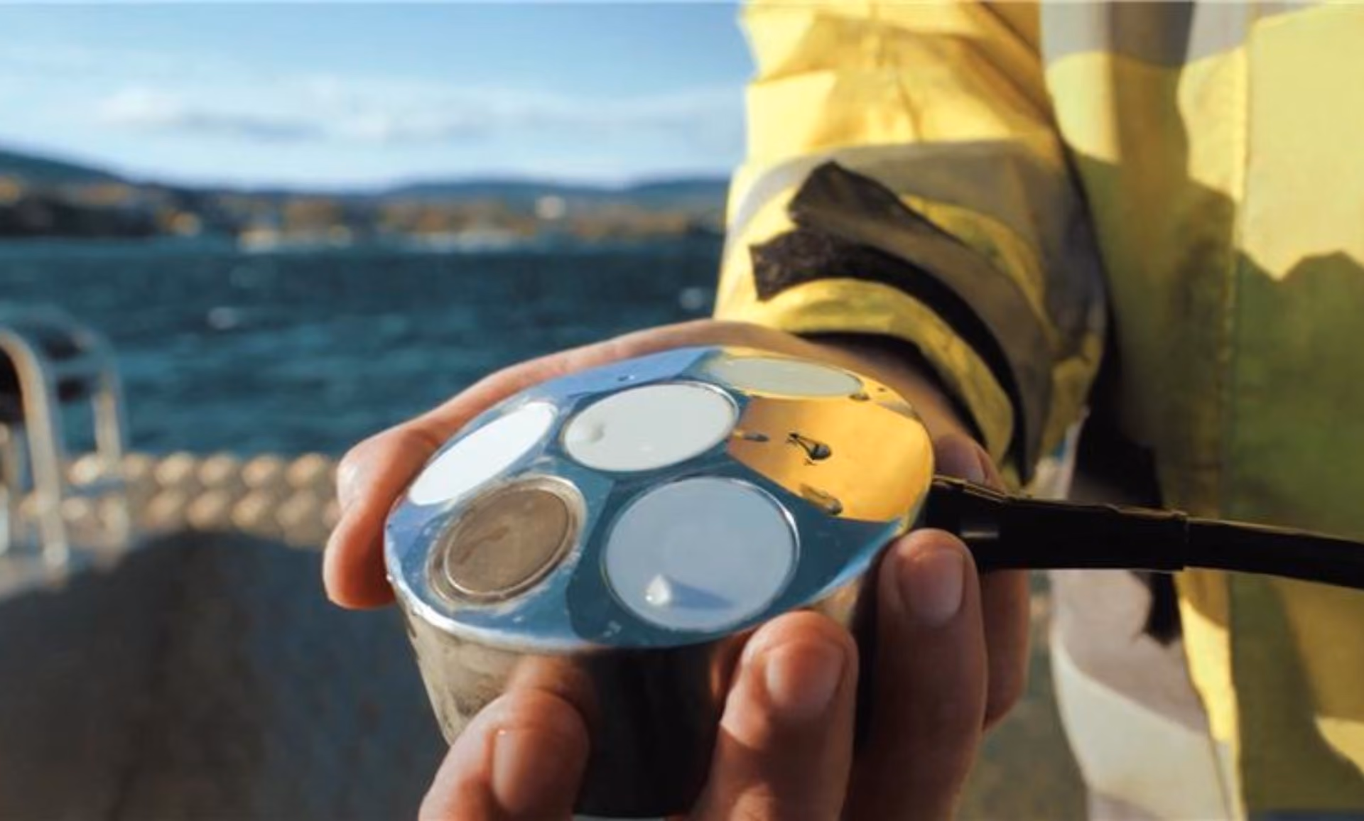Nortek Nucleus 1000 held in one hand – compact navigation sensor for ROV