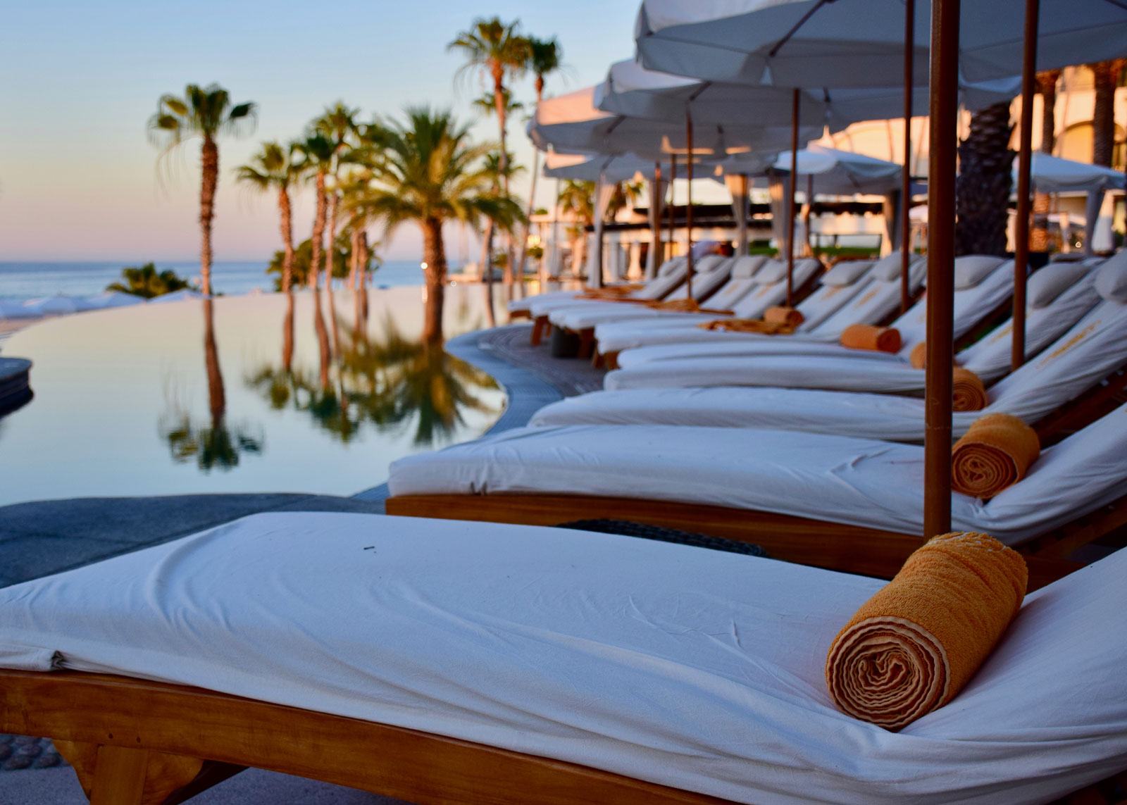 sunbathing beds by the pool
