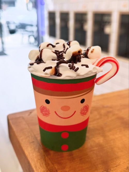 cup of coco in a snowman mug