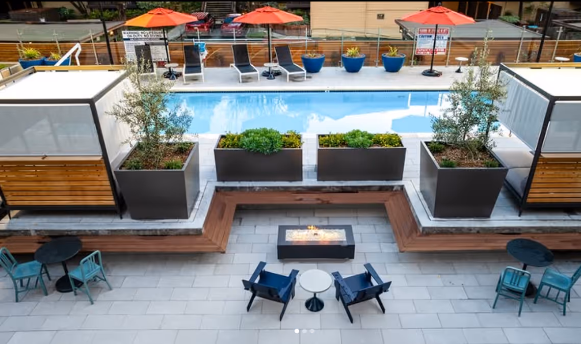Pool with lounge chair and fire pit