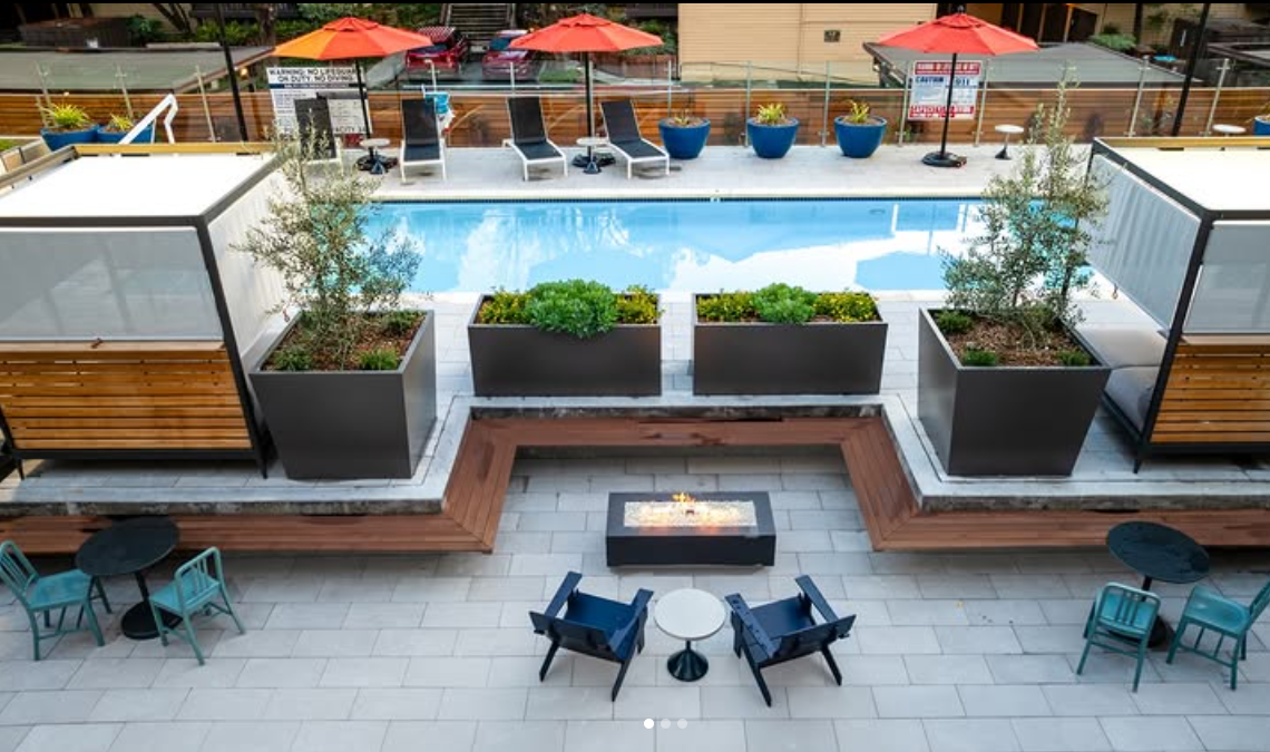 Pool with lounge chair and fire pit