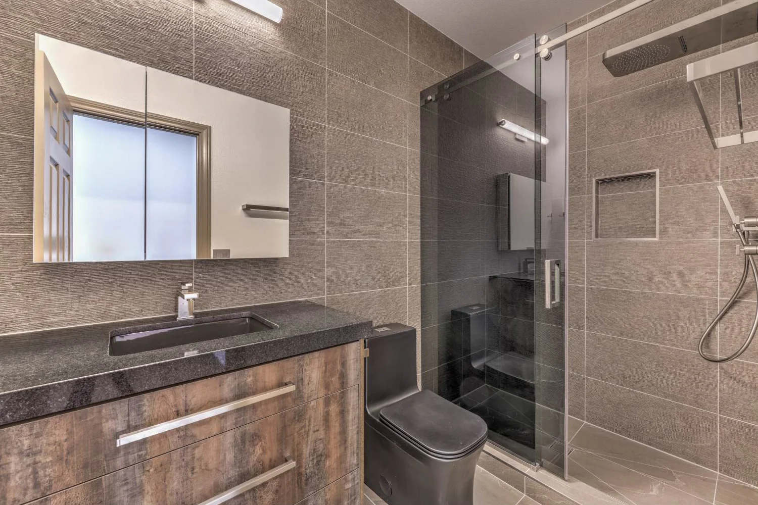 Midrange bathroom remodel Midrange bathroom remodel kept within its footprint for stronger resale ROI