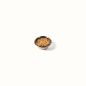 Puissante sauce coréenne Soy Garlic de Chikin Bang, à base de soja et d’ail, parfaite pour accompagner le poulet frit.