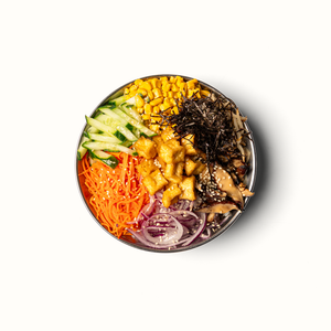 Veggie Bap de Chikin Bang, bibimbap coréen végétarien avec tofu, légumes frais, riz et sauce coréenne.