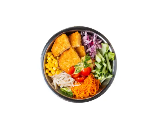 Salade veggie de Chikin Bang, mélange de légumes croquants et Suprême pané végétal HappyVore, assaisonné à la coréenne.