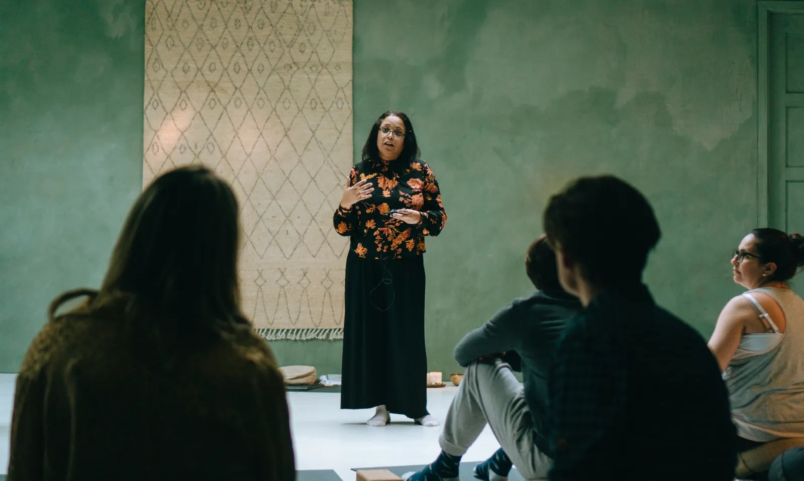 Speaker addressing participants at a Mamamoon workshop