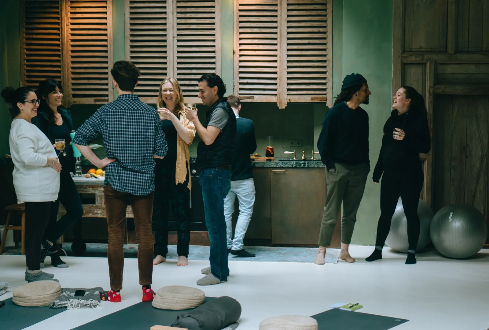 Participants talking during a break at a Mamamoon workshop