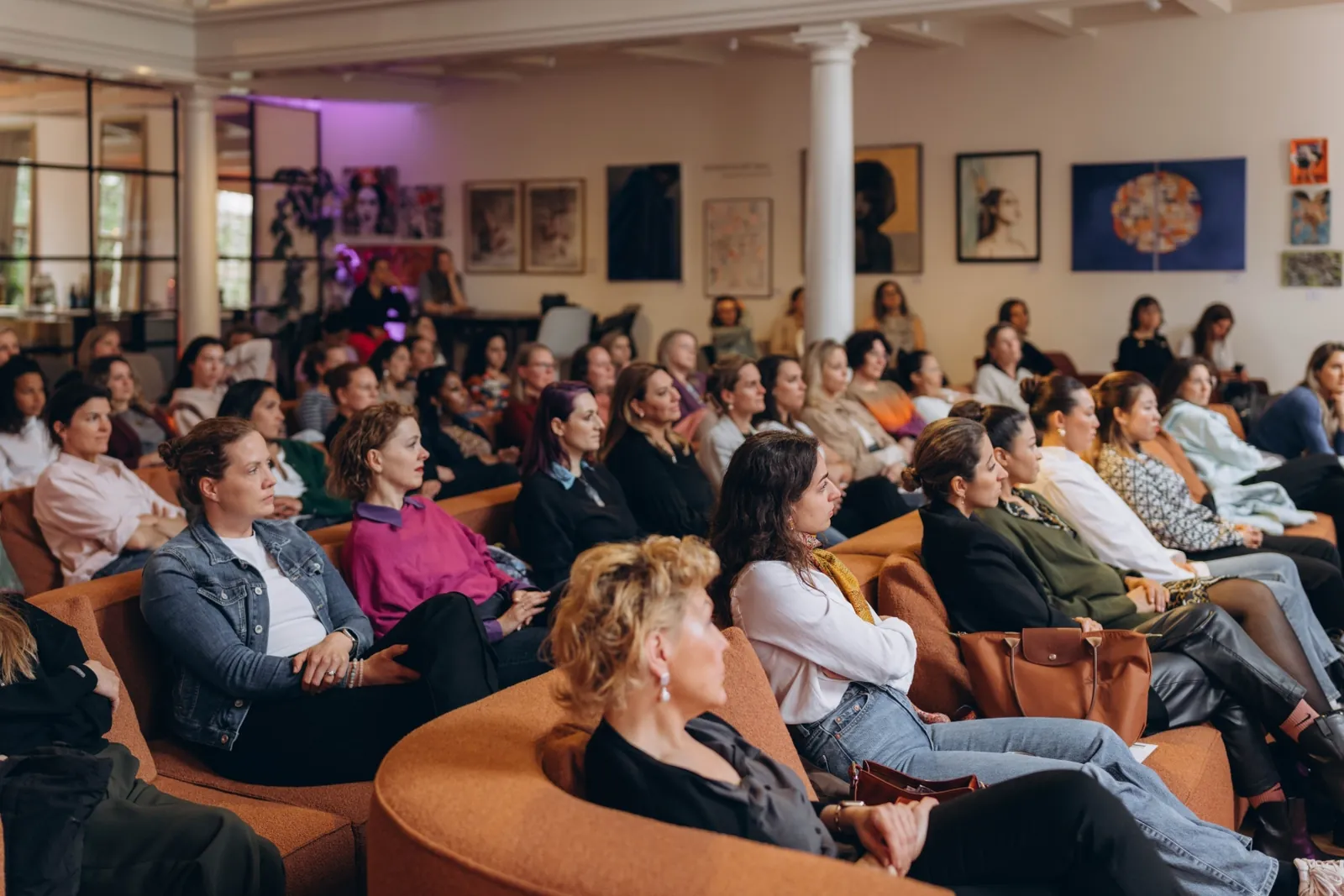Full audience at a Mamamoon corporate event
