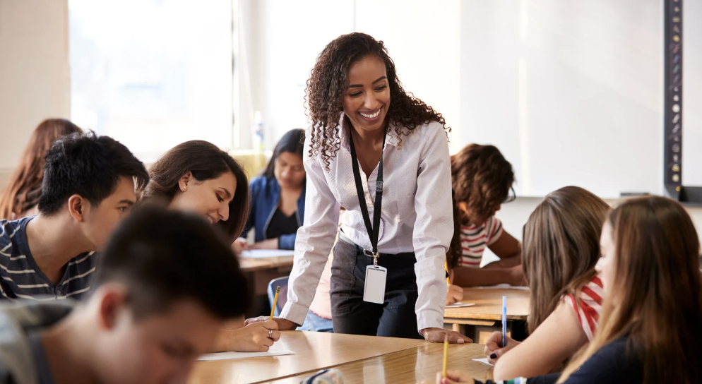teacher with teenage students