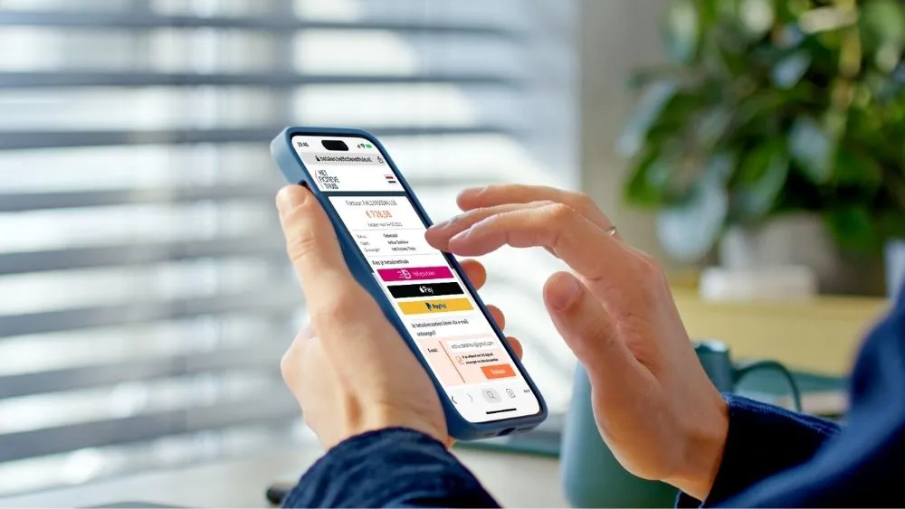 Mobiele telefoon waarop betaald wordt.