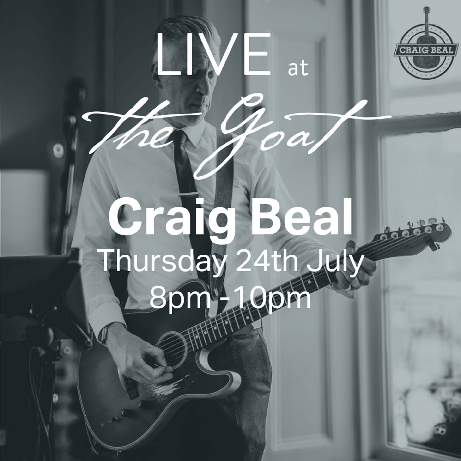 Craig Beal playing guitar for The Goat 