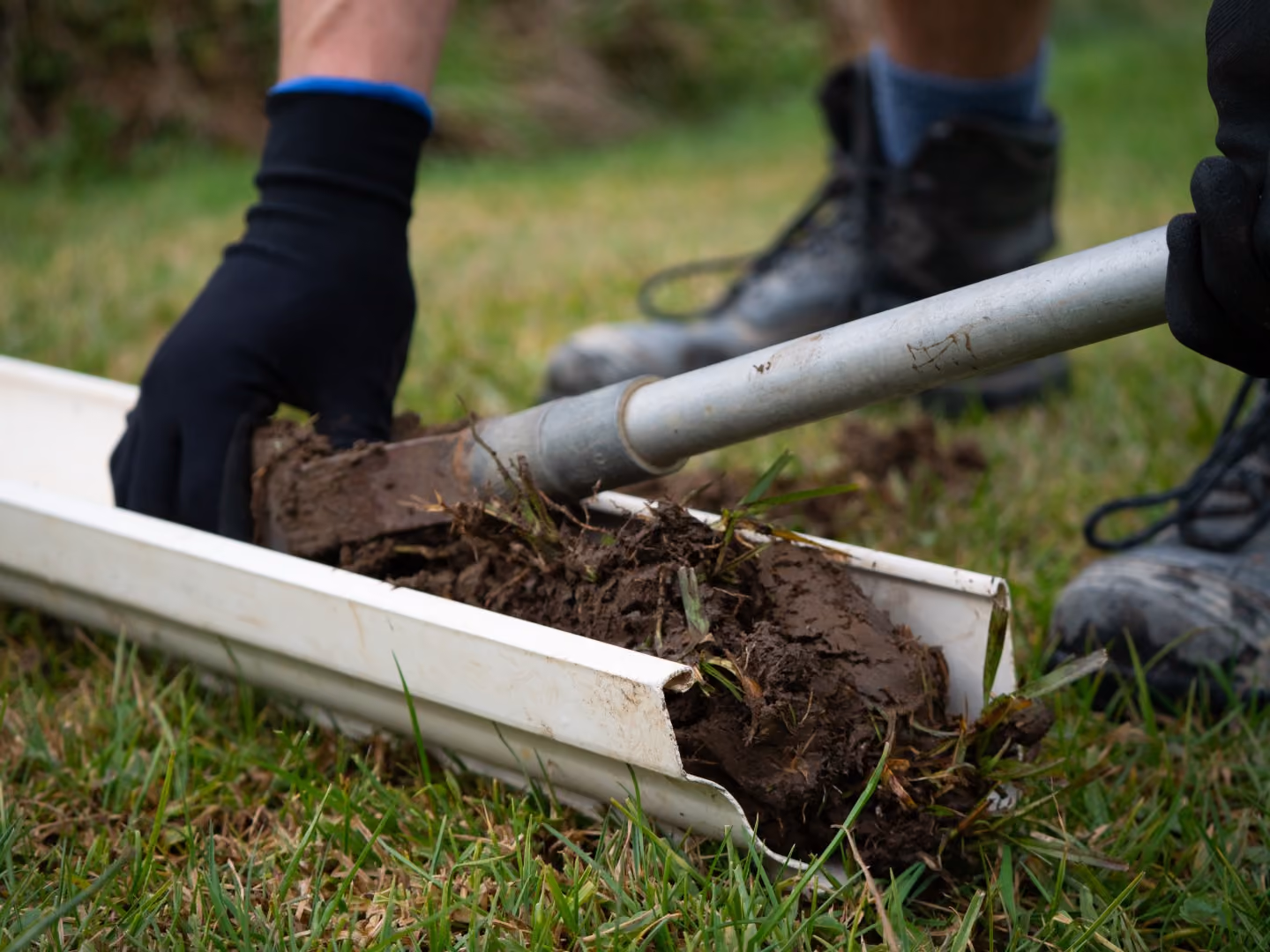 A Christchurch-based contaminated land specialist taking a core sample to test the soil at different depths