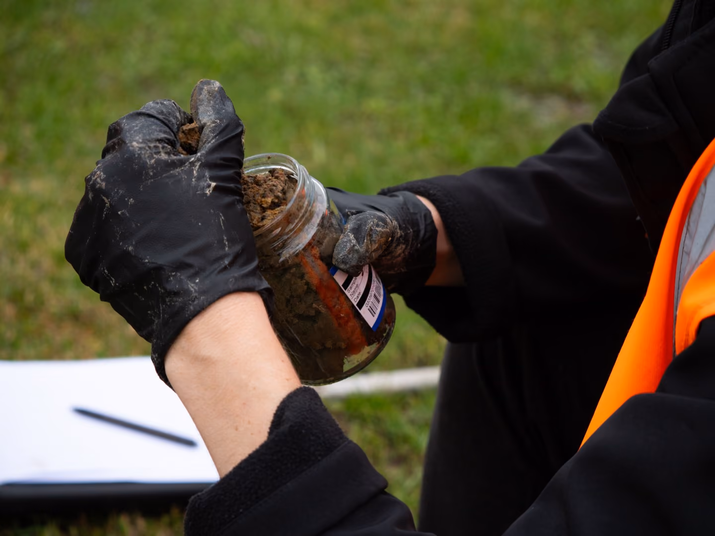A contaminated land scientist collected a soil sample for testing at the laboratory in New Zealand